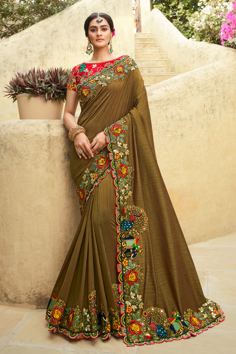 Beautiful Embroidered Designer Silk Saree comes with Heavy Designer Blouse